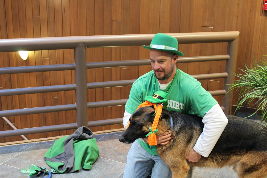 An employee with his dog at the office